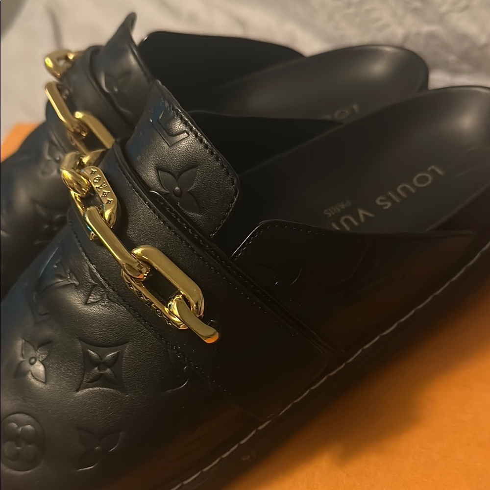 Louis Vuitton soft leather Black and Gold Mules with Elegant LV Design size 8.5
